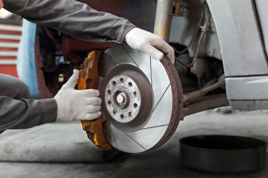 side-view-worker-repairing-car